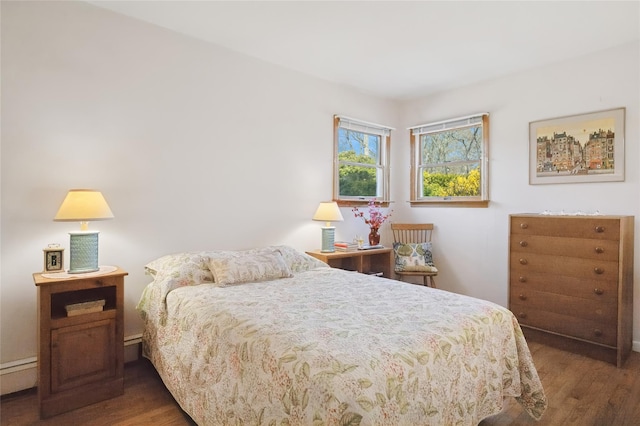 bedroom with wood finished floors