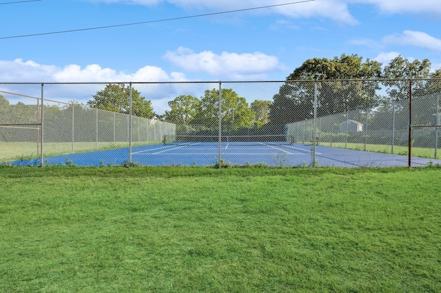view of sport court with fence