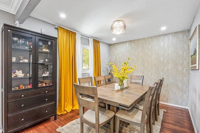 dining space featuring dark wood-style flooring, recessed lighting, wallpapered walls, and baseboards