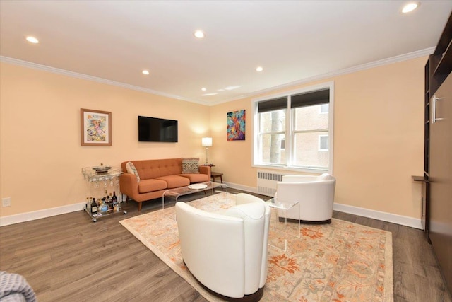 36 Barstow Unit 2-B, Great Neck, NY 11021 - living area with wood finished floors, ornamental molding, and radiator heating unit