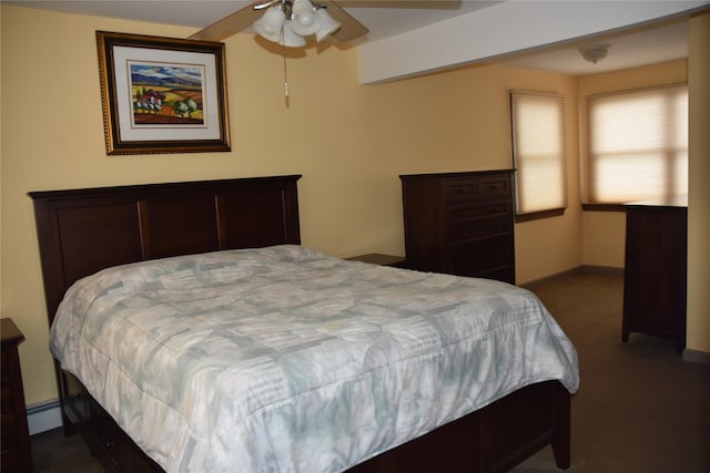 bedroom featuring baseboards, a baseboard radiator, carpet, and ceiling fan