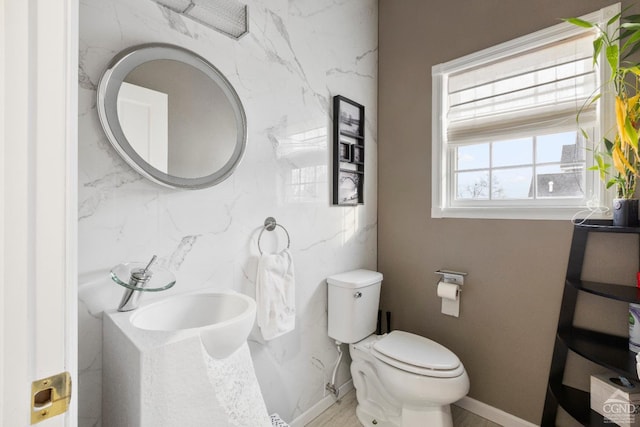 67 Latham Cir, Saugerties, NY 12477 - half bath featuring baseboards, toilet, and a sink