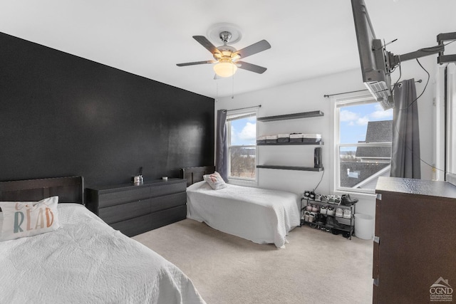 67 Latham Cir, Saugerties, NY 12477 - bedroom with a ceiling fan, multiple windows, and light colored carpet