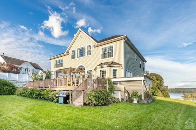 67 Latham Cir, Saugerties, NY 12477 - rear view of property with a lawn, stairway, and a deck with water view