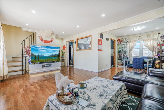 366 Neal Dow Ave, Staten Island, NY 10314 - living room with crown molding, stairway, wood finished floors, baseboards, and recessed lighting
