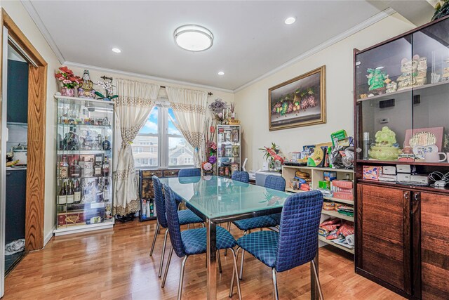 366 Neal Dow Ave, Staten Island, NY 10314 - dining area featuring crown molding, light wood-style floors, and recessed lighting