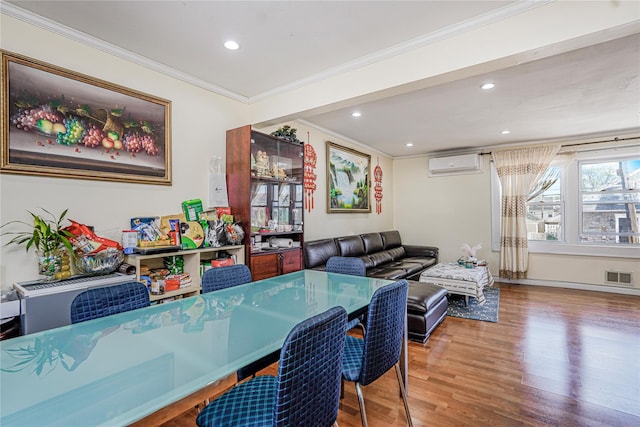 366 Neal Dow Ave, Staten Island, NY 10314 - dining space featuring crown molding, wood finished floors, a wall mounted air conditioner, and recessed lighting