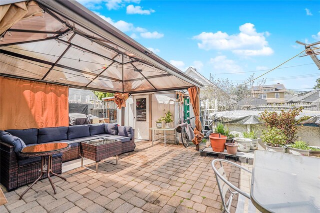 366 Neal Dow Ave, Staten Island, NY 10314 - view of patio / terrace with a gazebo, outdoor lounge area, and fence