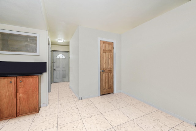 366 Neal Dow Ave, Staten Island, NY 10314 - unfurnished room featuring baseboards and light tile patterned floors