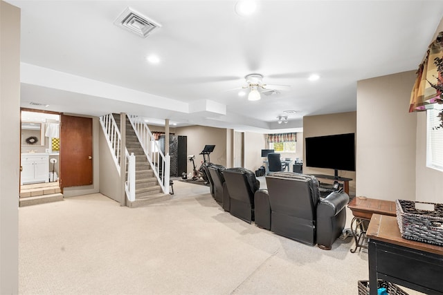 interior space featuring recessed lighting, visible vents, ceiling fan, and light colored carpet