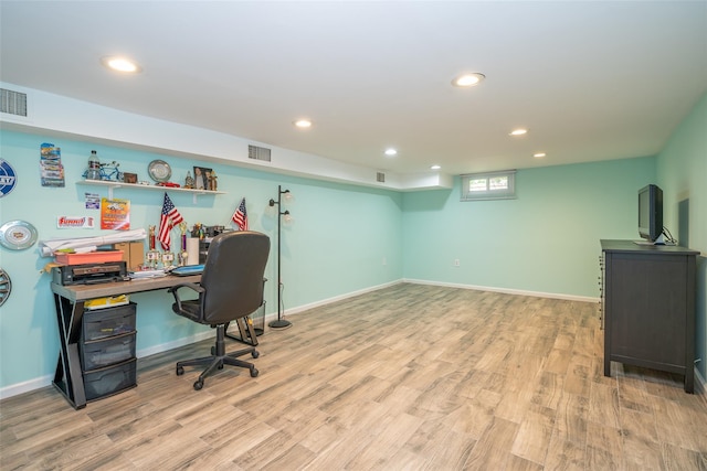 office area with light wood finished floors, recessed lighting, and baseboards