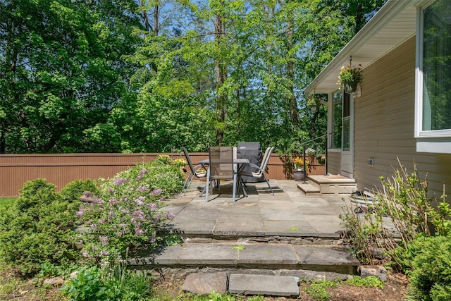 view of patio / terrace with fence and outdoor dining area