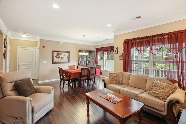living room featuring crown molding, dark wood-style floors, visible vents, and baseboards