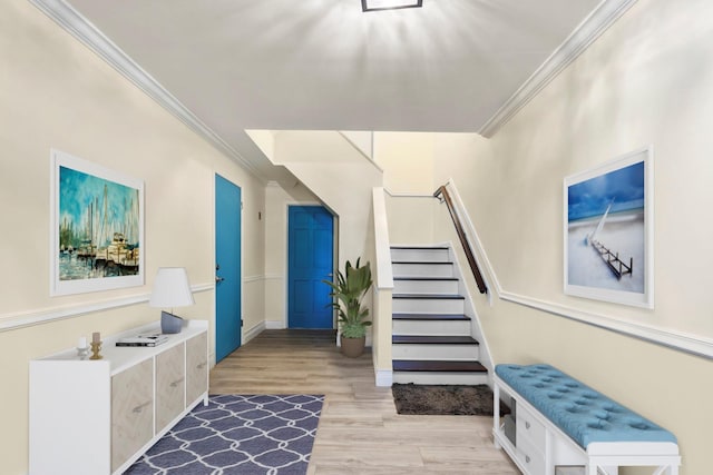 110 Gedney St, Nyack, NY 10960 - entryway featuring crown molding, light wood-style flooring, and stairway
