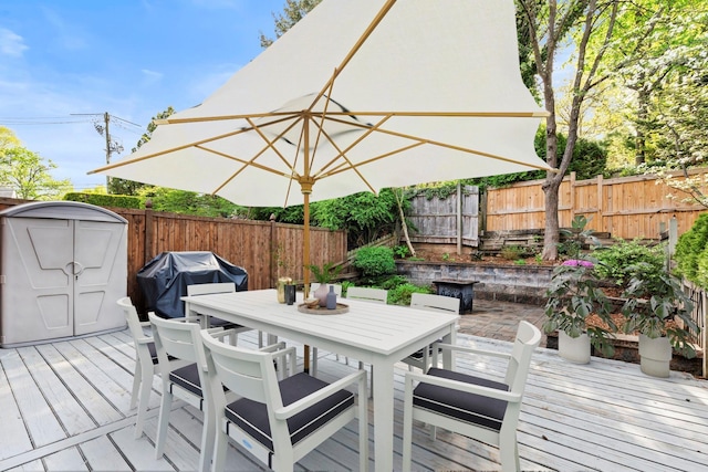 110 Gedney St, Nyack, NY 10960 - deck featuring a fenced backyard, outdoor dining area, grilling area, and a storage unit