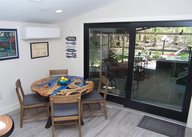 dining space with baseboards, a wall mounted AC, vaulted ceiling, and recessed lighting