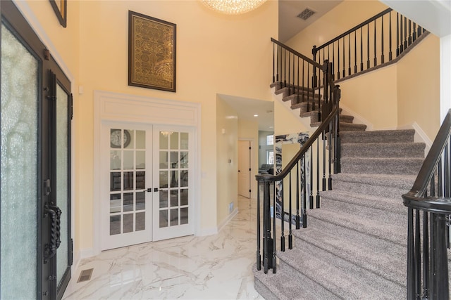 13 Orr-Hatch Dr, Cornwall, NY 12518 - entrance foyer featuring french doors, baseboards, marble finish floors, a high ceiling, and stairway