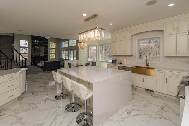 13 Orr-Hatch Dr, Cornwall, NY 12518 - kitchen with a sink, recessed lighting, a kitchen island, decorative light fixtures, and a chandelier