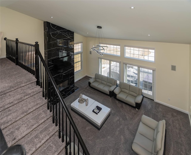 13 Orr-Hatch Dr, Cornwall, NY 12518 - carpeted living area with baseboards, a chandelier, recessed lighting, and lofted ceiling