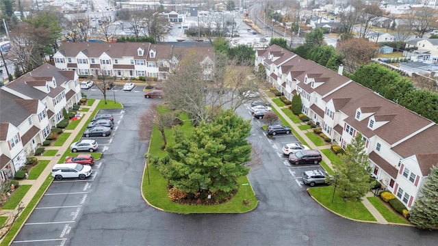 birds eye view of property with a residential view