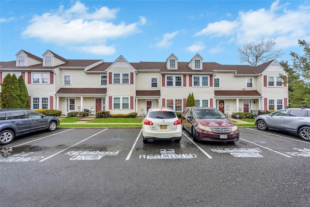 view of front of property with uncovered parking