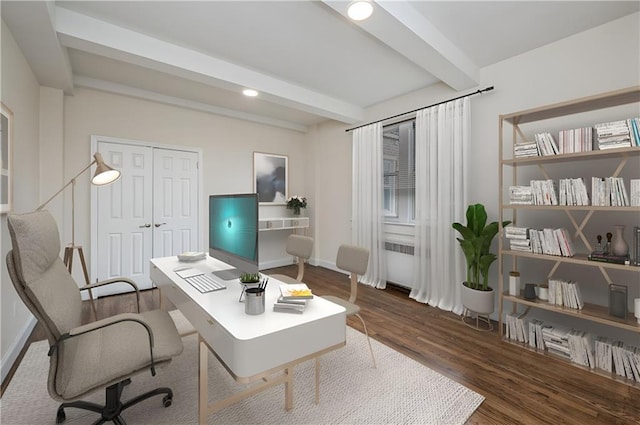 office area featuring wood finished floors, beamed ceiling, baseboards, radiator heating unit, and recessed lighting