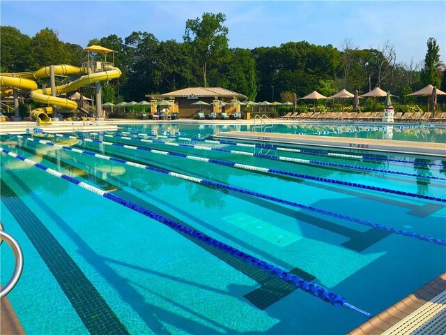community pool with a water slide