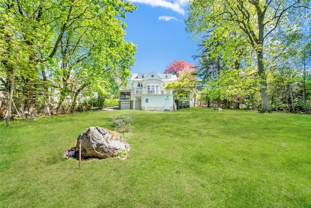 view of yard with an attached garage
