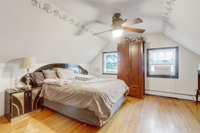 bedroom with a baseboard radiator, vaulted ceiling, light wood-style flooring, a ceiling fan, and cooling unit