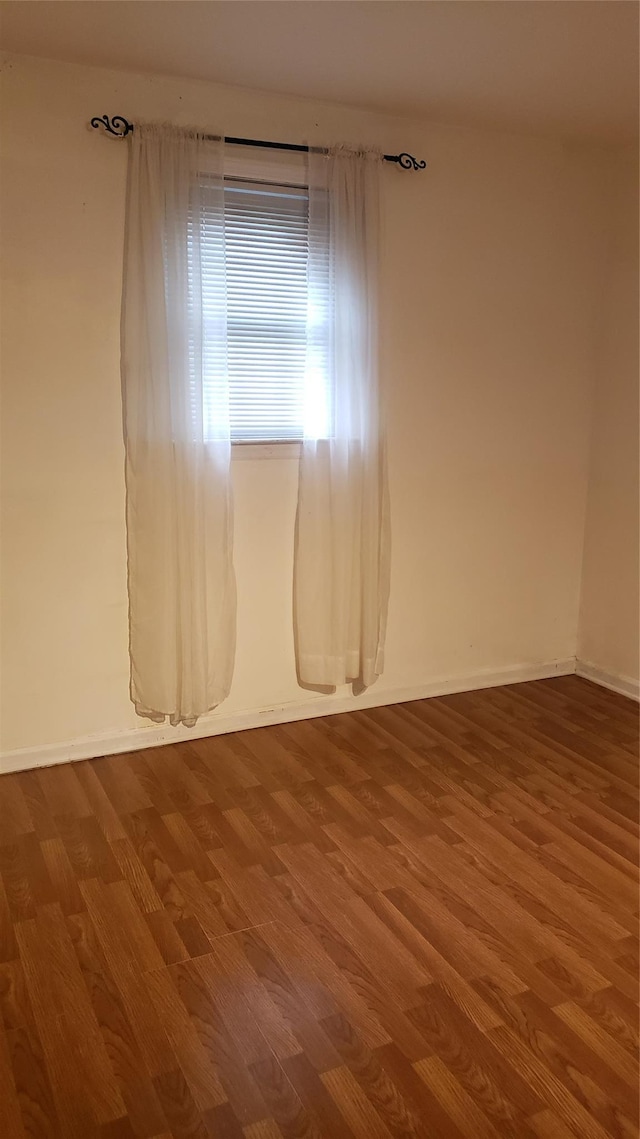 2261 Story Ave, Bronx, NY 10473 - unfurnished room featuring wood finished floors and baseboards