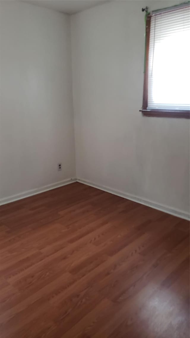 2261 Story Ave, Bronx, NY 10473 - spare room featuring wood finished floors and baseboards