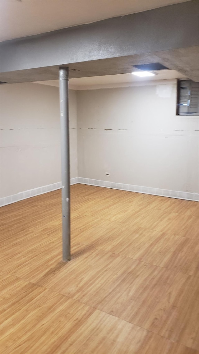 2261 Story Ave, Bronx, NY 10473 - finished basement with light wood-type flooring and baseboards