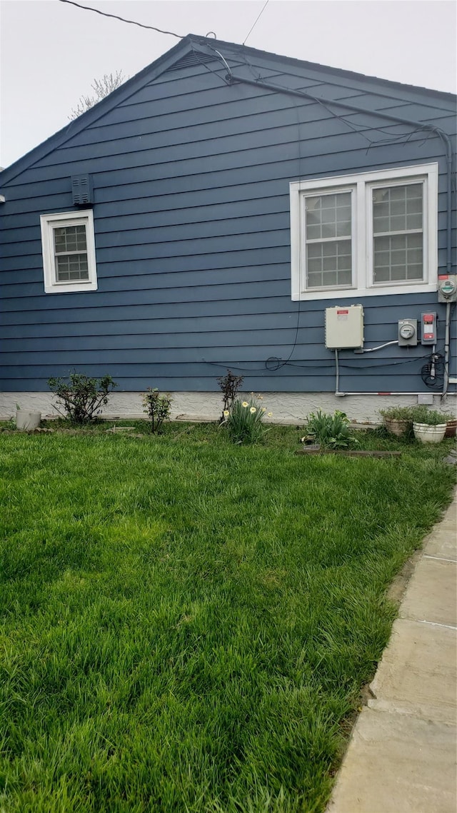 2261 Story Ave, Bronx, NY 10473 - view of side of home featuring a yard