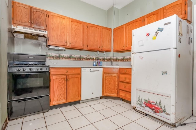 kitchen with a sink, white appliances, light countertops, brown cabinetry, and under cabinet range hood