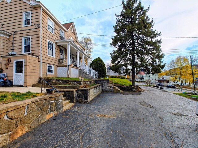 635 N Division St, Peekskill, NY 10566 - exterior space featuring stairway