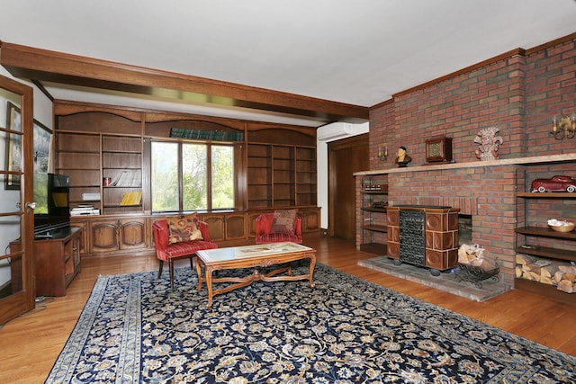 85 S Harrison Ave, Congers, NY 10920 - living room with light wood-style floors, a wall mounted AC, and beam ceiling