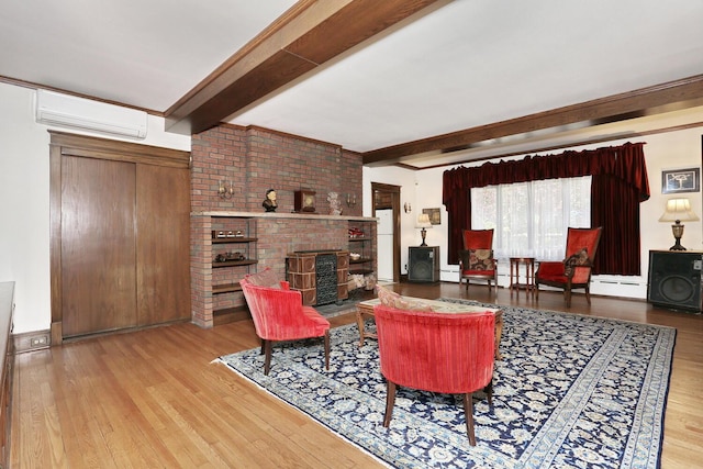 85 S Harrison Ave, Congers, NY 10920 - living room with beam ceiling, a wall mounted air conditioner, and wood finished floors