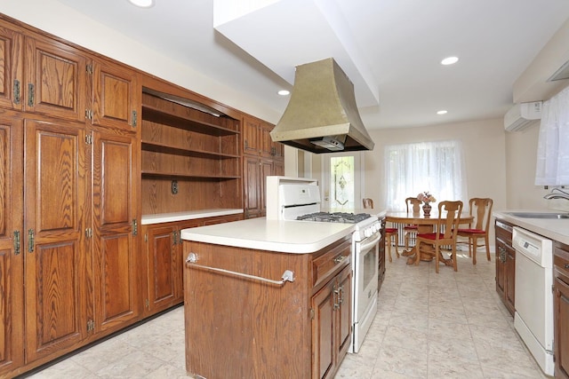 85 S Harrison Ave, Congers, NY 10920 - kitchen with a sink, brown cabinets, white appliances, and island range hood