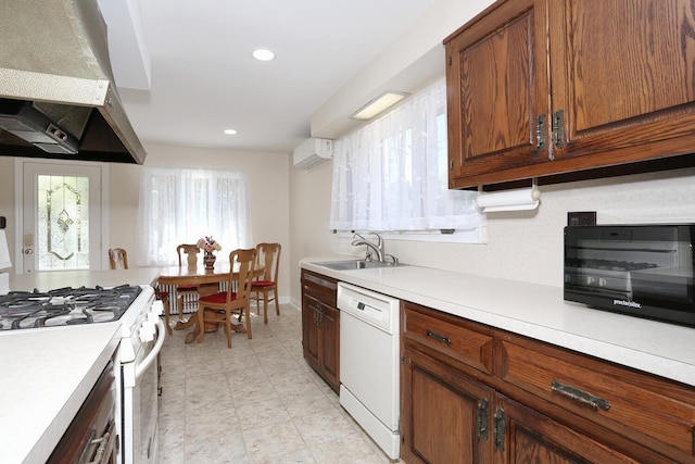 85 S Harrison Ave, Congers, NY 10920 - kitchen featuring white appliances, extractor fan, a sink, and light countertops