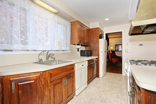 85 S Harrison Ave, Congers, NY 10920 - kitchen with a sink, light countertops, under cabinet range hood, and white appliances