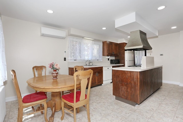 85 S Harrison Ave, Congers, NY 10920 - kitchen featuring island exhaust hood, white dishwasher, black microwave, a wall mounted air conditioner, and light countertops