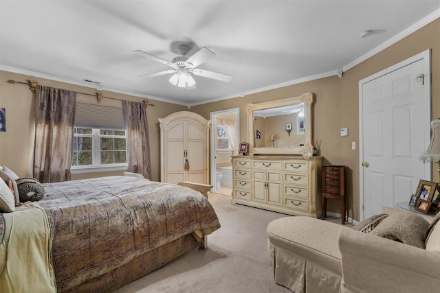 bedroom featuring light colored carpet, connected bathroom, crown molding, and ceiling fan
