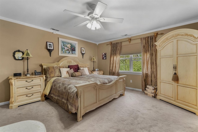 bedroom featuring visible vents, ornamental molding, baseboards, and light carpet