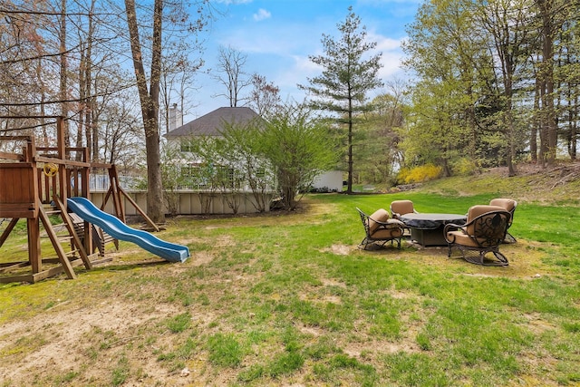view of yard with a playground