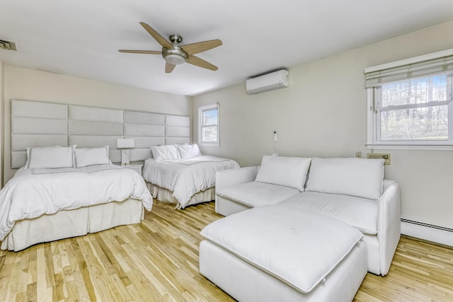 bedroom featuring a wall mounted AC, ceiling fan, visible vents, wood finished floors, and a baseboard radiator