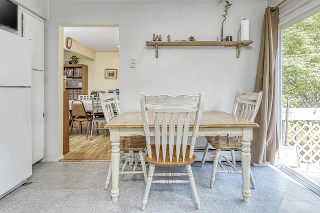 dining room featuring light floors