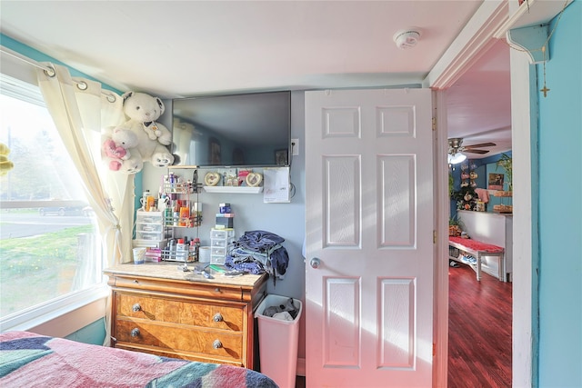 bedroom with wood finished floors
