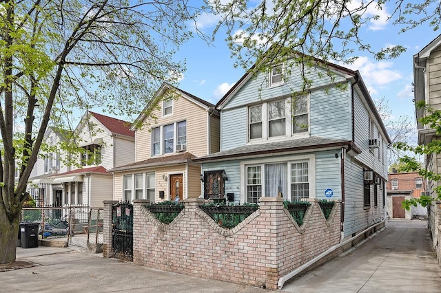 26-18 92nd St, East Elmhurst, NY 11369 - view of front of home with a gate and fence