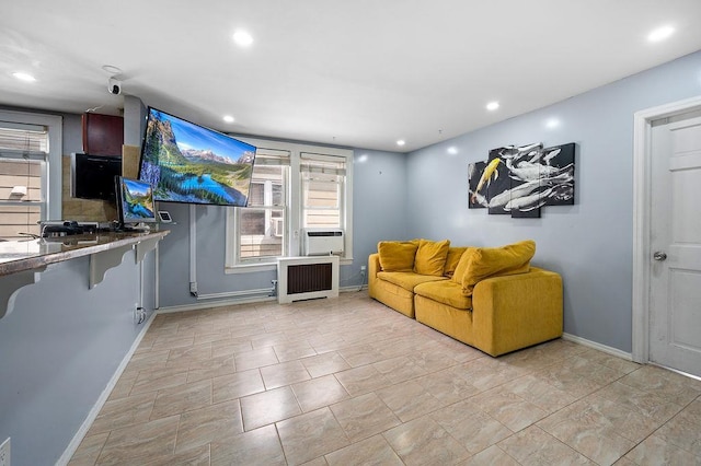26-18 92nd St, East Elmhurst, NY 11369 - living room featuring radiator heating unit, baseboards, recessed lighting, and cooling unit