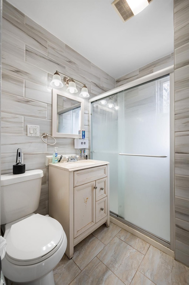 26-18 92nd St, East Elmhurst, NY 11369 - bathroom with a shower stall, toilet, and vanity